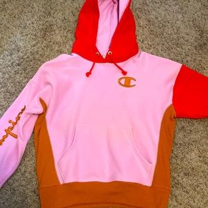 Pink, red, and tan Champion hoodie